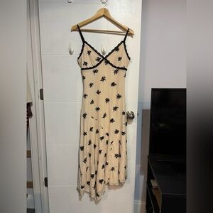 Peppermayo Cream Maxi Dress with Black Floral Design